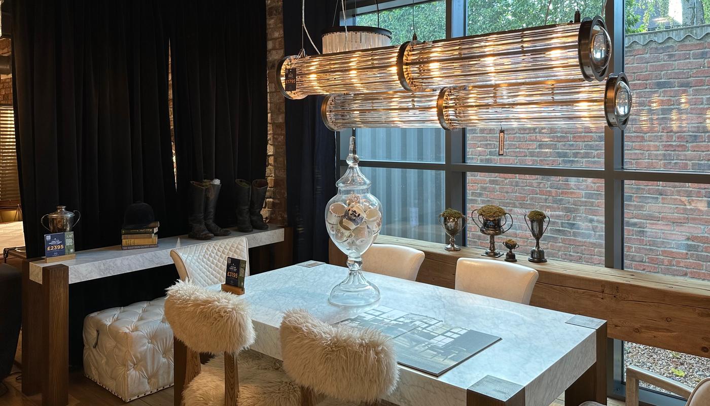 Timothy Oulton Guildford showroom interior newton pendant and junction dining table