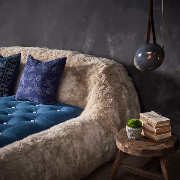 Argali Bed Frame in Yeti Beige close up image featuring pillows