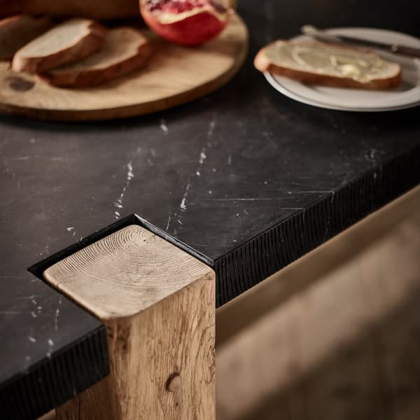 Invictus Dining Table close up detail of oak leg