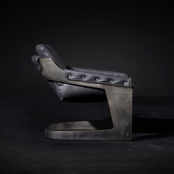 Grand Prix Armchair in Perforated Road Racer Carbon & Raw Steel side view
