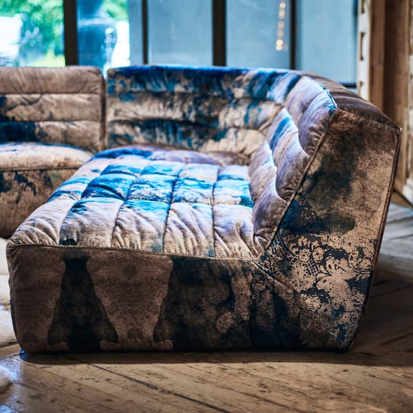 shabby sectional sofa in faded and degraded melting paisley finish