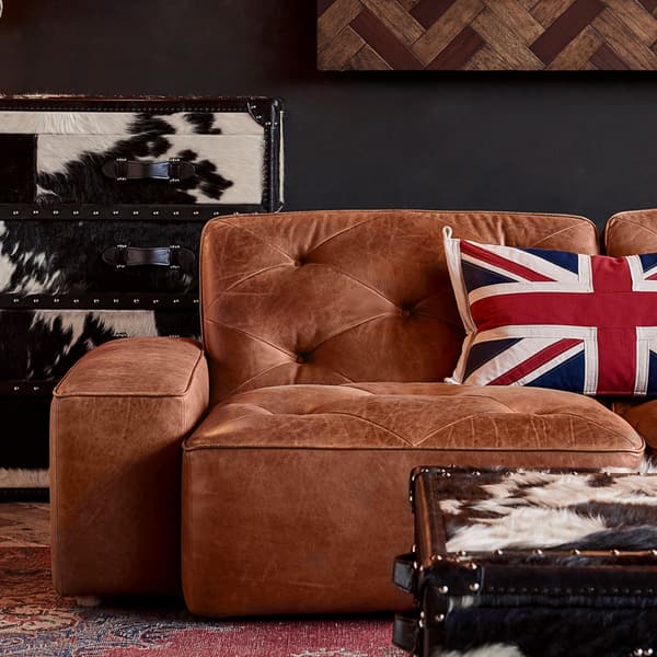 shabby tufted sectional sofa cropped close up product view