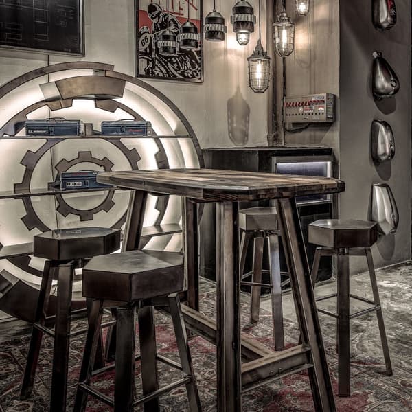bolt barstool featured next to table