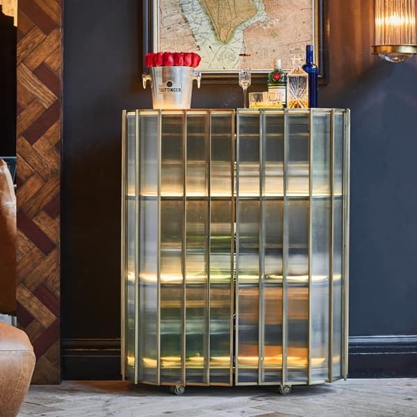 Shimmer bar cabinet displayed closed with drinks