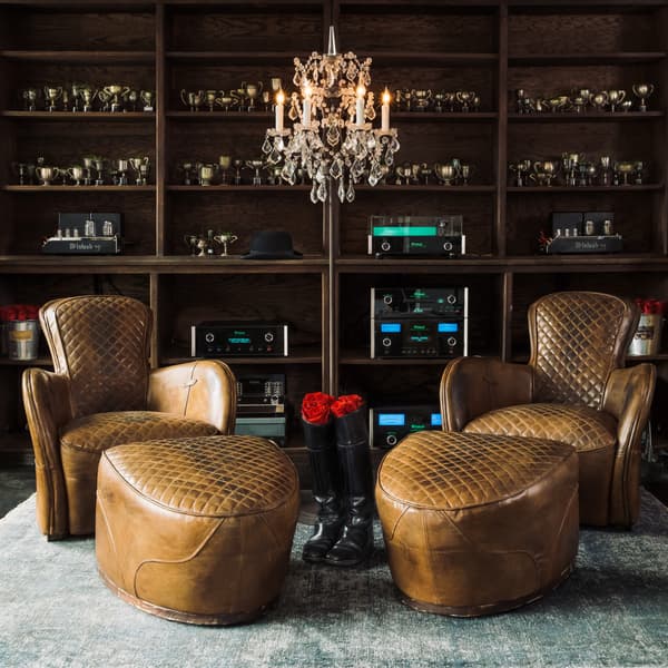 Pair of Saddle footstools shown side by side
