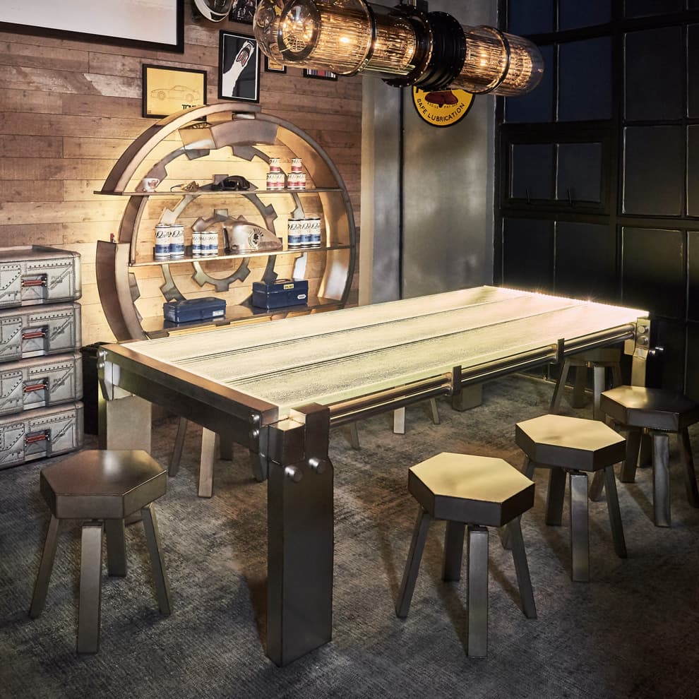 Multiple bolt stools featured at table in room setting